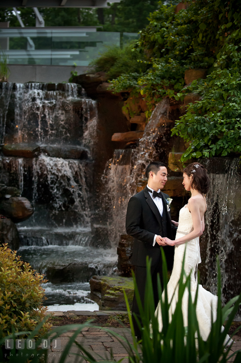 Bride and Groom smiling and looking at each other. Falls Church Virginia 2941 Restaurant wedding reception photo, by wedding photographers of Leo Dj Photography. http://leodjphoto.com