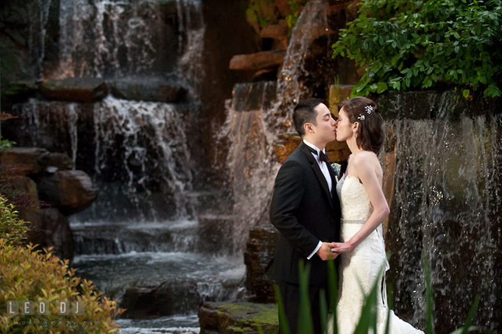 Bride and Groom kissing. Falls Church Virginia 2941 Restaurant wedding reception photo, by wedding photographers of Leo Dj Photography. http://leodjphoto.com