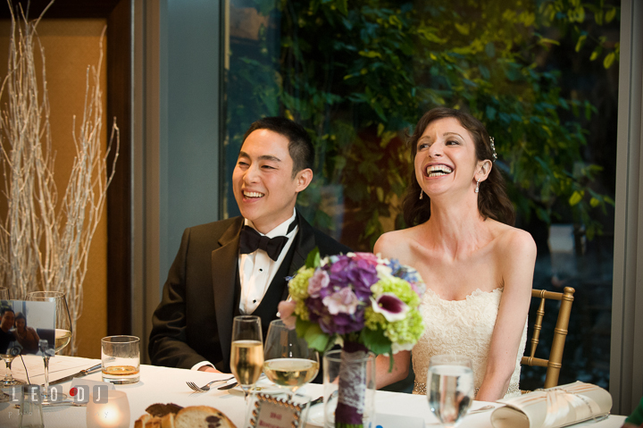 Bride and Groom laughing listening to Best Man's speech. Falls Church Virginia 2941 Restaurant wedding reception photo, by wedding photographers of Leo Dj Photography. http://leodjphoto.com