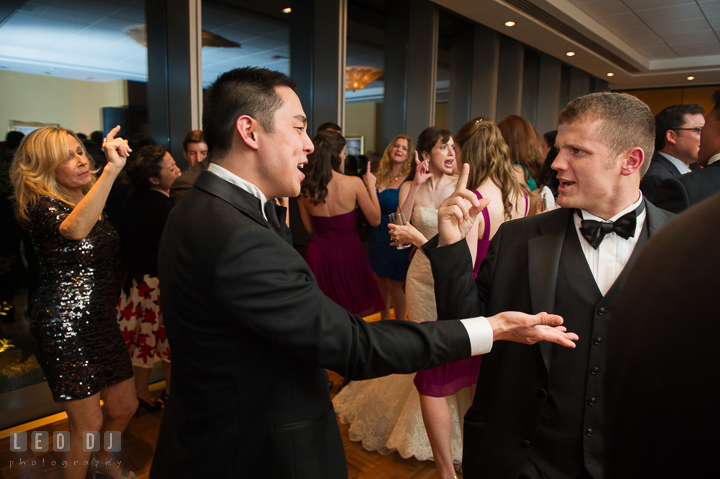 Groom and Groomsman singing Carly Rae Jepsen's Call Me Maybe. Falls Church Virginia 2941 Restaurant wedding reception photo, by wedding photographers of Leo Dj Photography. http://leodjphoto.com