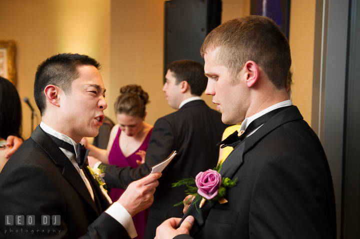 Groom acting giving number to Groomsman for Carly Rae Jepsen Call Me Maybe song. Falls Church Virginia 2941 Restaurant wedding reception photo, by wedding photographers of Leo Dj Photography. http://leodjphoto.com