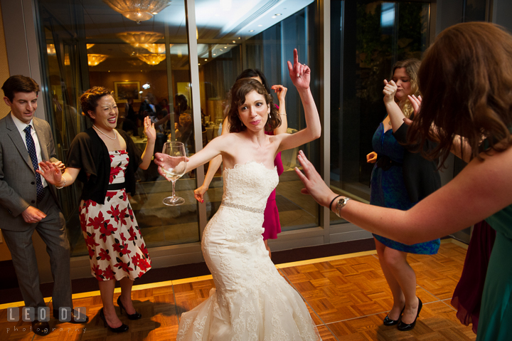 Bride dancing in a middle of guests circle. Falls Church Virginia 2941 Restaurant wedding reception photo, by wedding photographers of Leo Dj Photography. http://leodjphoto.com