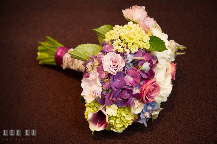 Bride's beautiful flower bouquet from Flowers by Sher. Falls Church Virginia 2941 Restaurant wedding reception photo, by wedding photographers of Leo Dj Photography. http://leodjphoto.com