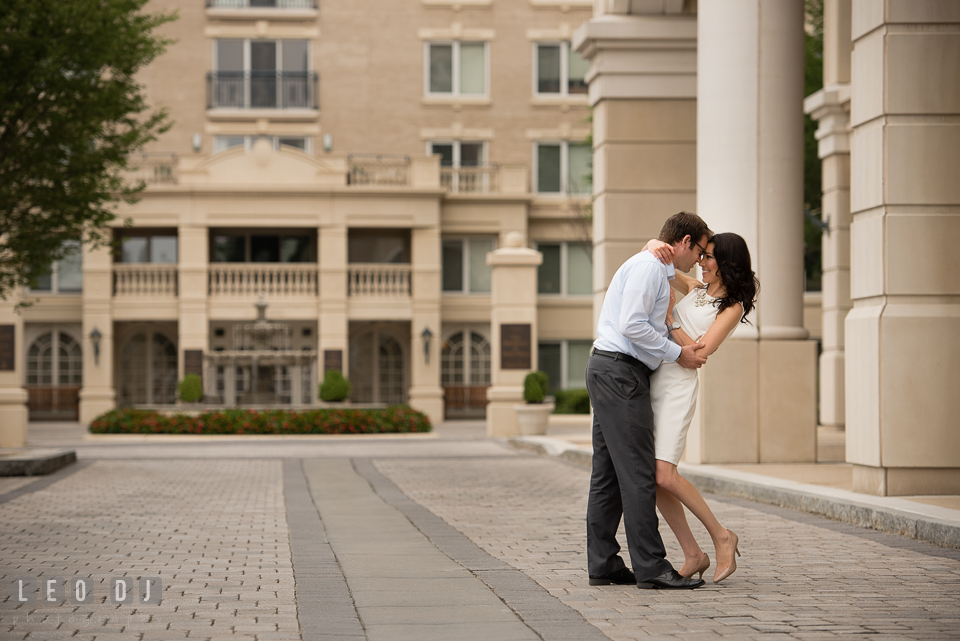 Engaged couple hugging and almost dip. Annapolis Eastern Shore Maryland pre-wedding engagement photo session at downtown, by wedding photographers of Leo Dj Photography. http://leodjphoto.com