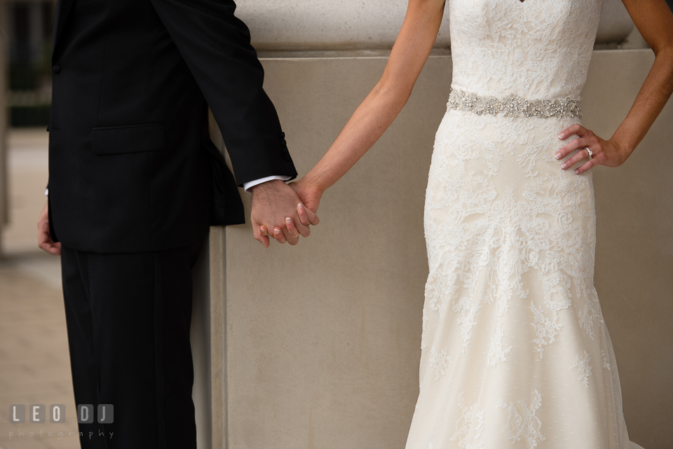 Close up of Bride and Groom holding hands before their first glance. Loews Annapolis Hotel Maryland wedding, by wedding photographers of Leo Dj Photography. http://leodjphoto.com