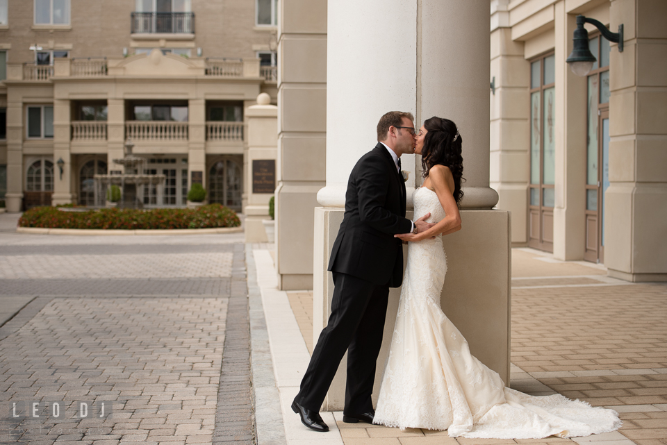 Bride and Groom kissing during their first glance. Loews Annapolis Hotel Maryland wedding, by wedding photographers of Leo Dj Photography. http://leodjphoto.com