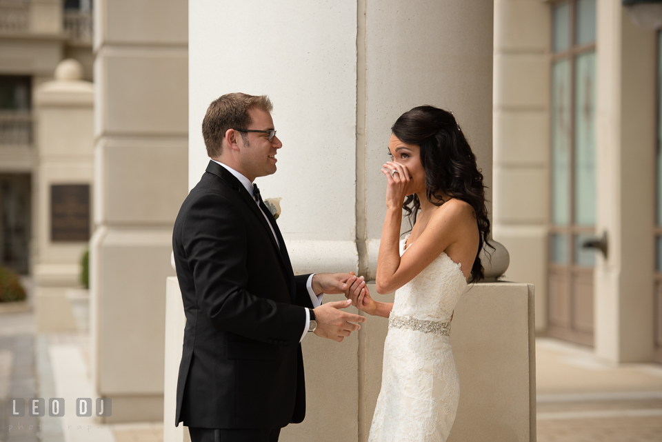 Bride shedding tear during their first look. Loews Annapolis Hotel Maryland wedding, by wedding photographers of Leo Dj Photography. http://leodjphoto.com