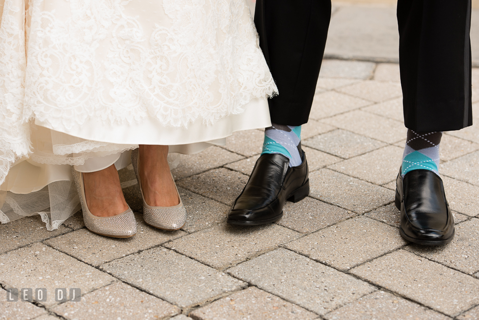 Close up view of Bride and Groom's shoes and socks. Loews Annapolis Hotel Maryland wedding, by wedding photographers of Leo Dj Photography. http://leodjphoto.com