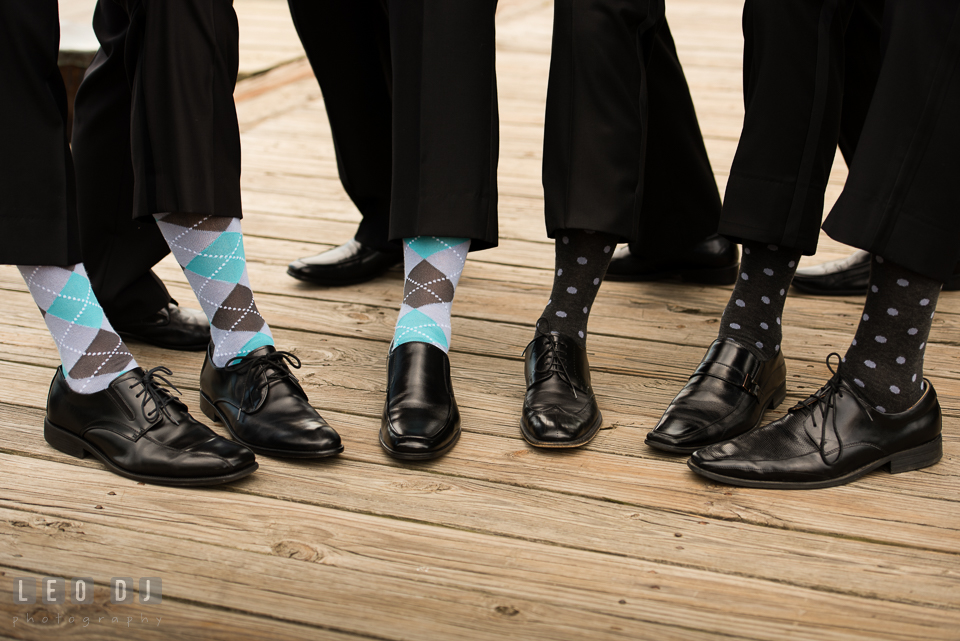 Groom, Best Man, and Groomsmen showing their socks. Loews Annapolis Hotel Maryland wedding, by wedding photographers of Leo Dj Photography. http://leodjphoto.com