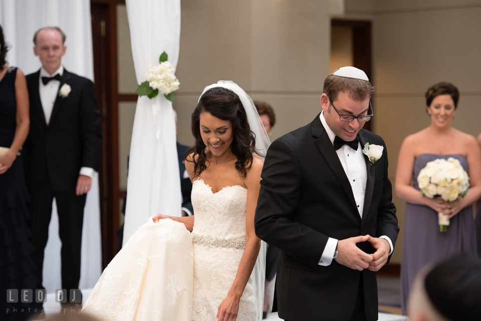 Bride circling Groom during circling ritual in Jewish wedding ceremony. Loews Annapolis Hotel Maryland wedding, by wedding photographers of Leo Dj Photography. http://leodjphoto.com