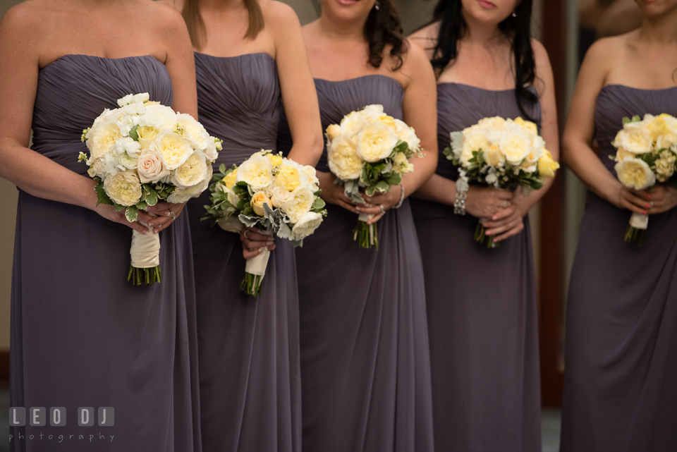 Maid of Honor and Bridesmaids holding their bouquets during the ceremony. Loews Annapolis Hotel Maryland wedding, by wedding photographers of Leo Dj Photography. http://leodjphoto.com