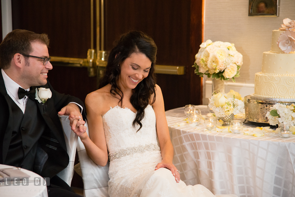 Bride and Groom laughing during toast speech. Loews Annapolis Hotel Maryland wedding, by wedding photographers of Leo Dj Photography. http://leodjphoto.com