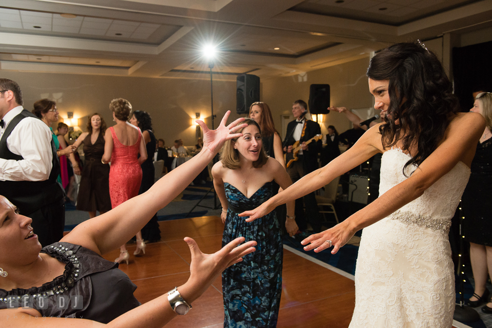 Bride and guests doing silly dances. Loews Annapolis Hotel Maryland wedding, by wedding photographers of Leo Dj Photography. http://leodjphoto.com