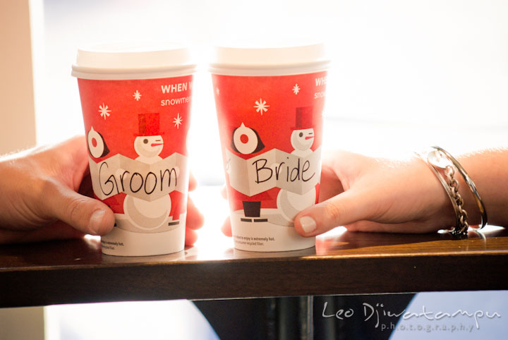 Starbuck coffee cups with bride and groom inscription. Pre-wedding or engagement photo session at Annapolis city harbor, Maryland, Eastern Shore, by wedding photographers of Leo Dj Photography.