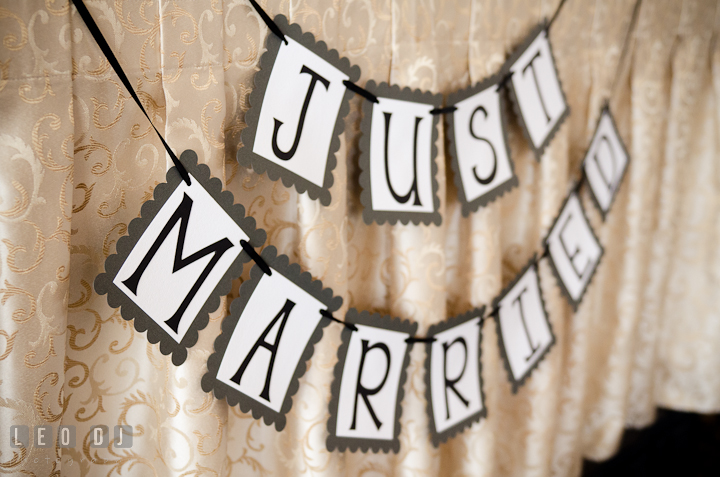 Just married banner. The Ballroom at The Chesapeake Inn wedding ceremony photos, Chesapeake City, Maryland by photographers of Leo Dj Photography.