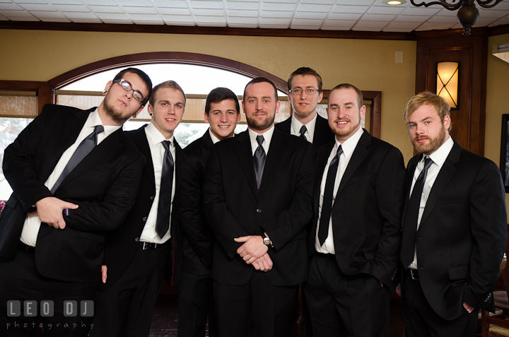 Groom, best man, and groomsmen posing. The Ballroom at The Chesapeake Inn wedding ceremony photos, Chesapeake City, Maryland by photographers of Leo Dj Photography.