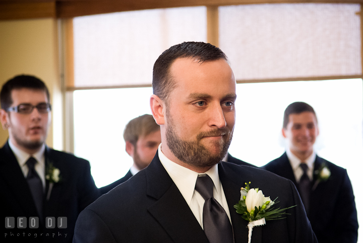 Groom smiled seeing Bride the first time in her wedding dress. The Ballroom at The Chesapeake Inn wedding ceremony photos, Chesapeake City, Maryland by photographers of Leo Dj Photography.