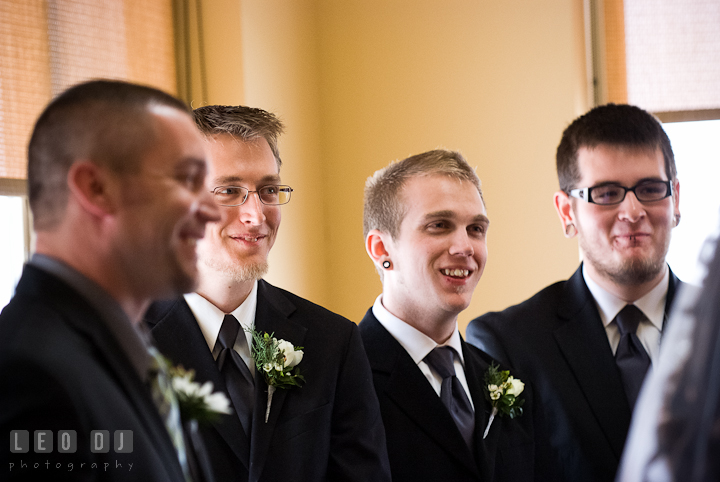 Best man and groomsmen smiling. The Ballroom at The Chesapeake Inn wedding ceremony photos, Chesapeake City, Maryland by photographers of Leo Dj Photography.