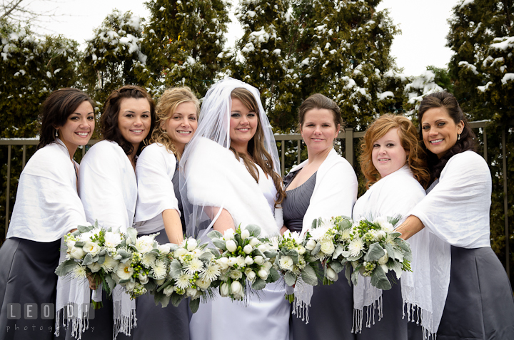 Bride, Matron of Honor, and Bridesmaids showing their bouquets. The Ballroom at The Chesapeake Inn wedding ceremony photos, Chesapeake City, Maryland by photographers of Leo Dj Photography.