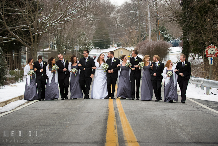 Bride, Groom and the Bridal Party walking together on the road. The Ballroom at The Chesapeake Inn wedding ceremony photos, Chesapeake City, Maryland by photographers of Leo Dj Photography.