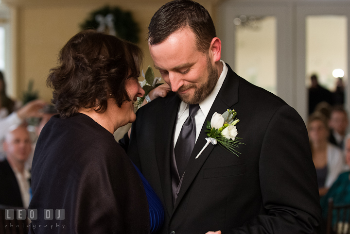 Groom smiling while dancing with Mother. The Ballroom at The Chesapeake Inn wedding reception photos, Chesapeake City, Maryland by photographers of Leo Dj Photography.