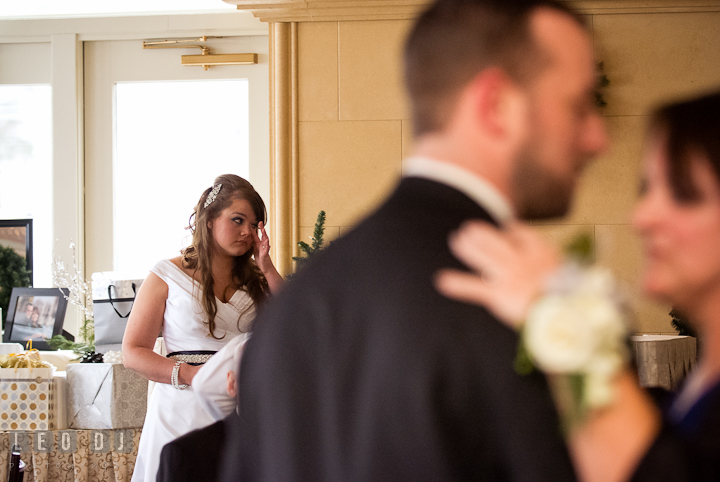 Bride emotional watching Mother of the Groom and Son dance. The Ballroom at The Chesapeake Inn wedding reception photos, Chesapeake City, Maryland by photographers of Leo Dj Photography.