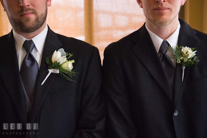 Groom and Best Man with their boutonniere. The Ballroom at The Chesapeake Inn wedding reception photos, Chesapeake City, Maryland by photographers of Leo Dj Photography.