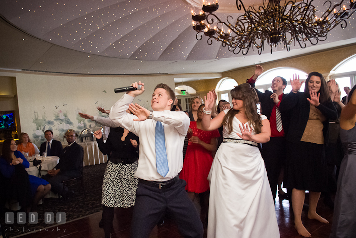 Bride and guests dancing to Crank That by Soulja Boy. The Ballroom at The Chesapeake Inn wedding reception photos, Chesapeake City, Maryland by photographers of Leo Dj Photography.