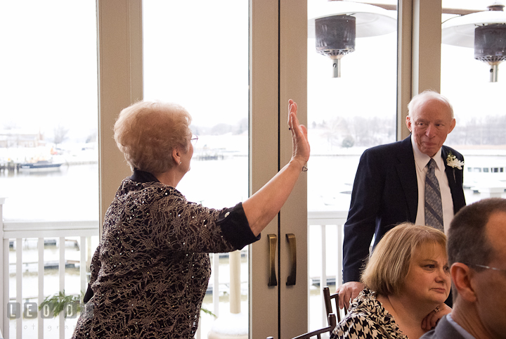 Grandma dancing while being watched by Grandpa. The Ballroom at The Chesapeake Inn wedding reception photos, Chesapeake City, Maryland by photographers of Leo Dj Photography.