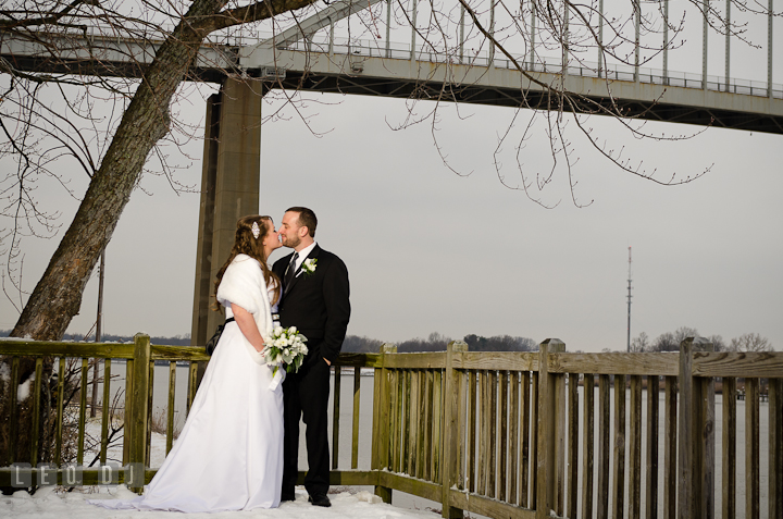 Bride and Groom almost kissed with bridge in the background. The Ballroom at The Chesapeake Inn wedding reception photos, Chesapeake City, Maryland by photographers of Leo Dj Photography.