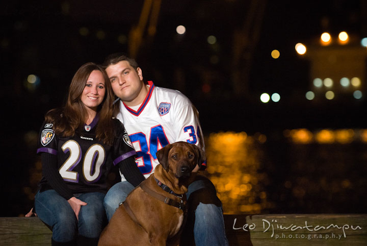 Portrait of an engaged couple and their rhodesian ridgeback dog. Fells Point Baltimore Maryland pre-wedding engagement photo session with their dog pet by wedding photographers of Leo Dj Photography