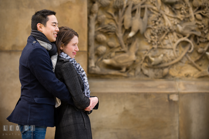 Engaged guy hugging his fiancée at Bethesda Terrace, Central Park. Pre-wedding engagement photo session at New York City, NY, by wedding photographers of Leo Dj Photography. http://leodjphoto.com