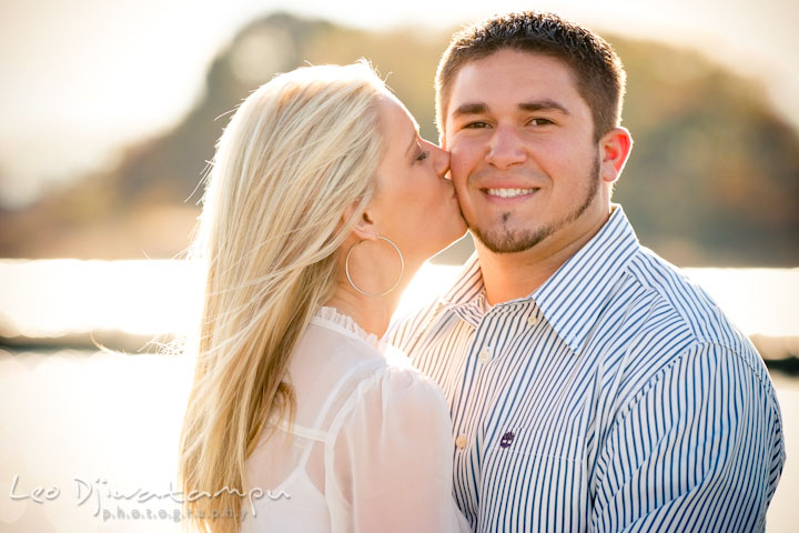 An engaged guy got kissed by his fiancée. Stevensville, Kent Island, Maryland, Pre-Wedding Engagement Photographer, Leo Dj Photography