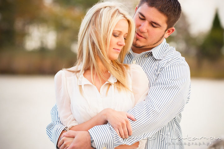 Engaged girl is being hugged by her fiancé. Stevensville, Kent Island, Maryland, Pre-Wedding Engagement Photographer, Leo Dj Photography