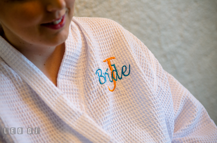 Bride wearing custom embroidered robe. Cruise ship destination wedding ceremony photos, Hotel Melia Cozumel Mexico by photographers of Leo Dj Photography.