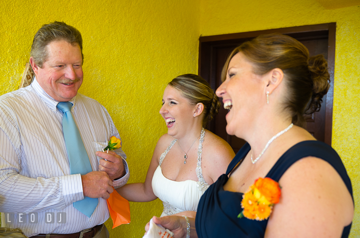 Father, mother, and bride laughing together. Cruise ship destination wedding ceremony photos, Hotel Melia Cozumel Mexico by photographers of Leo Dj Photography.