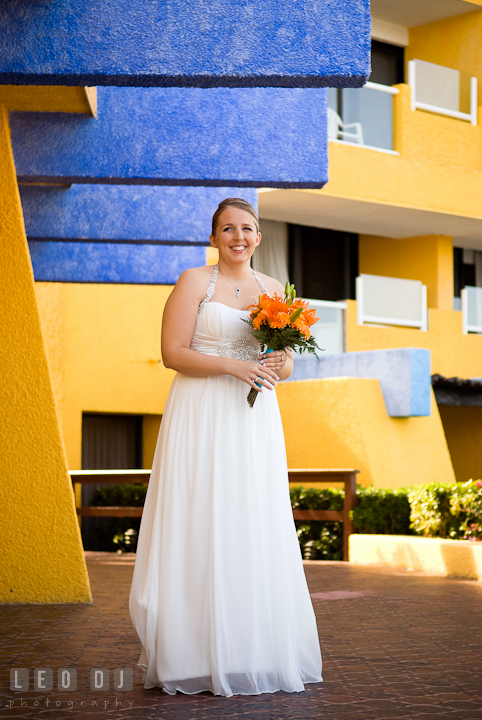 Bride laughing waiting for Groom to come. Cruise ship destination wedding ceremony photos, Hotel Melia Cozumel Mexico by photographers of Leo Dj Photography.