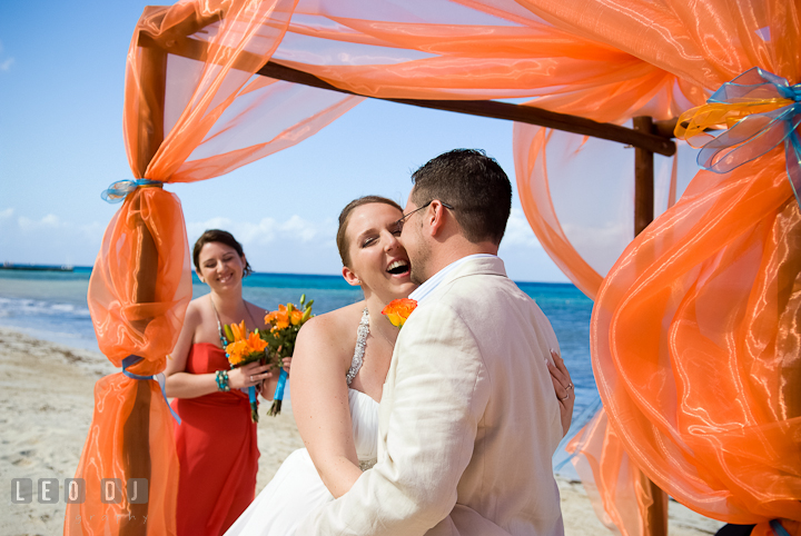 Bride and Groom officially husband and wife. Cruise ship destination wedding ceremony photos, Hotel Melia Cozumel Mexico by photographers of Leo Dj Photography.