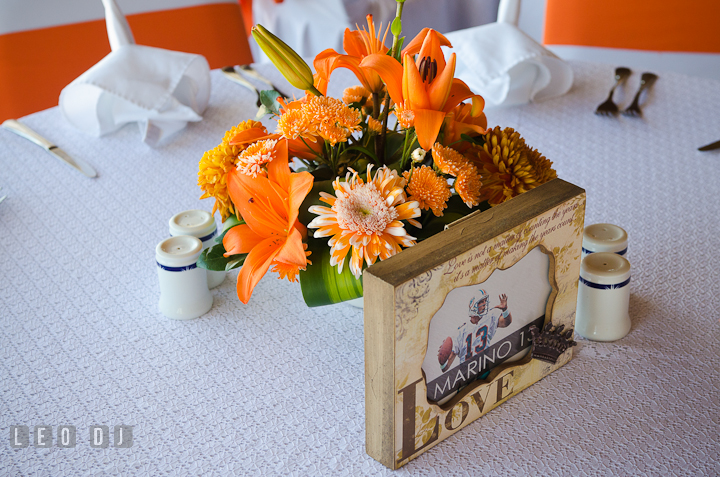 Table decoration number using football player jersey number. Carnival Cruise ship destination wedding reception photos of Jessica and Chad, Cozumel Mexico by photographers of Leo Dj Photography.