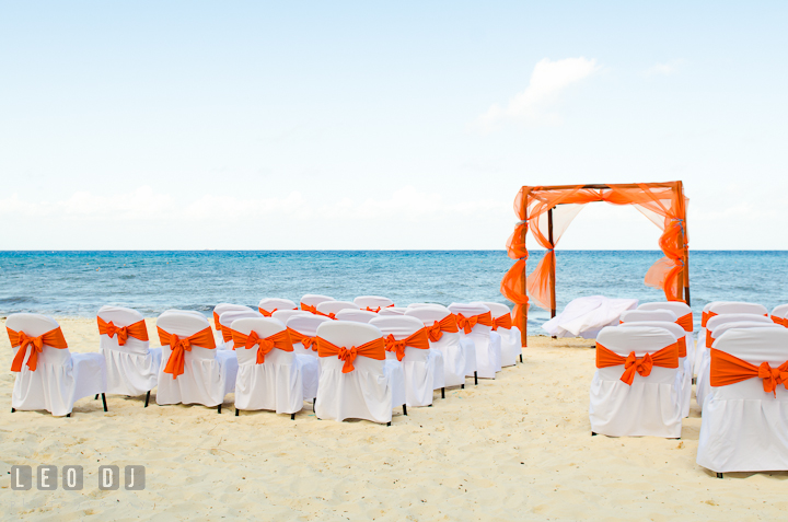 Wedding ceremony site on the beach with white sand and blue water. Carnival Cruise ship destination wedding reception photos of Jessica and Chad, Cozumel Mexico by photographers of Leo Dj Photography.