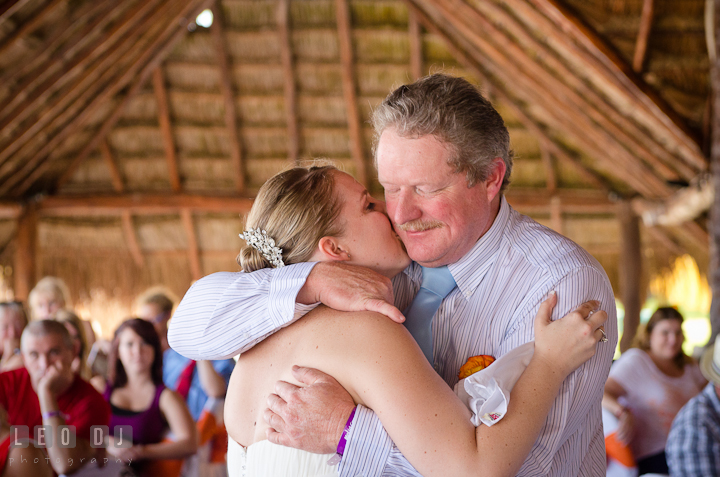 Bride kissed Dad during Father Daughter dance. Carnival Cruise ship destination wedding reception photos of Jessica and Chad, Cozumel Mexico by photographers of Leo Dj Photography.