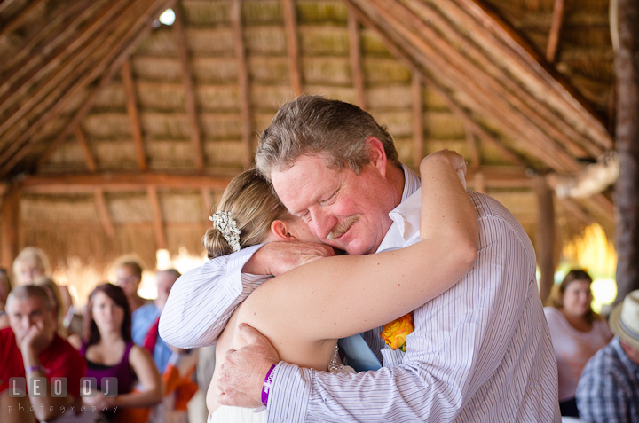 Bride hugged Dad during Father Daughter dance. Carnival Cruise ship destination wedding reception photos of Jessica and Chad, Cozumel Mexico by photographers of Leo Dj Photography.