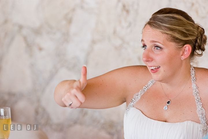Bride gave thumbs up during Mother Son dance. Carnival Cruise ship destination wedding reception photos of Jessica and Chad, Cozumel Mexico by photographers of Leo Dj Photography.