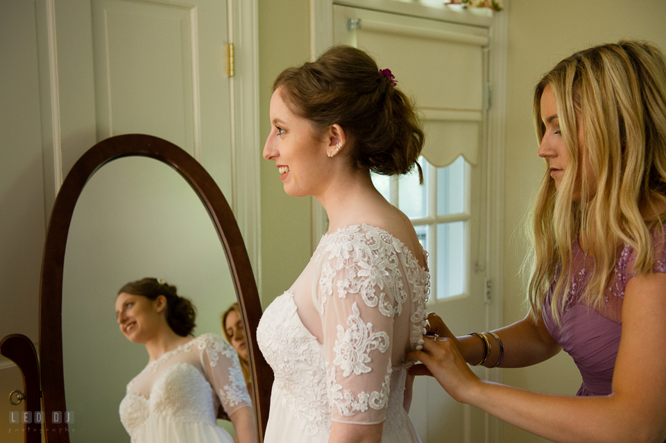 Kent Island Maryland maid of honor help button up Bride's wedding gown photo by Leo Dj Photography