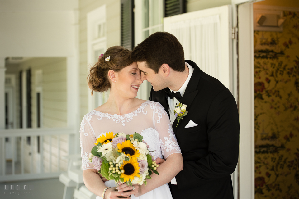 Kent Manor Inn wedding Bride and Groom cuddling by Leo Dj Photography