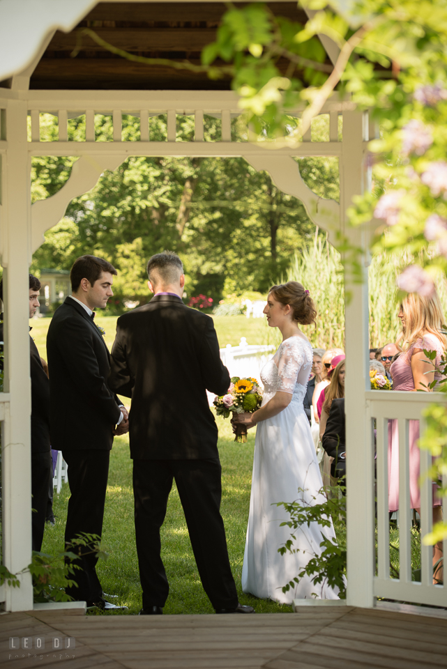 Kent Manor Inn Bride and Groom reciting vow during wedding ceremony photo by Leo Dj Photography