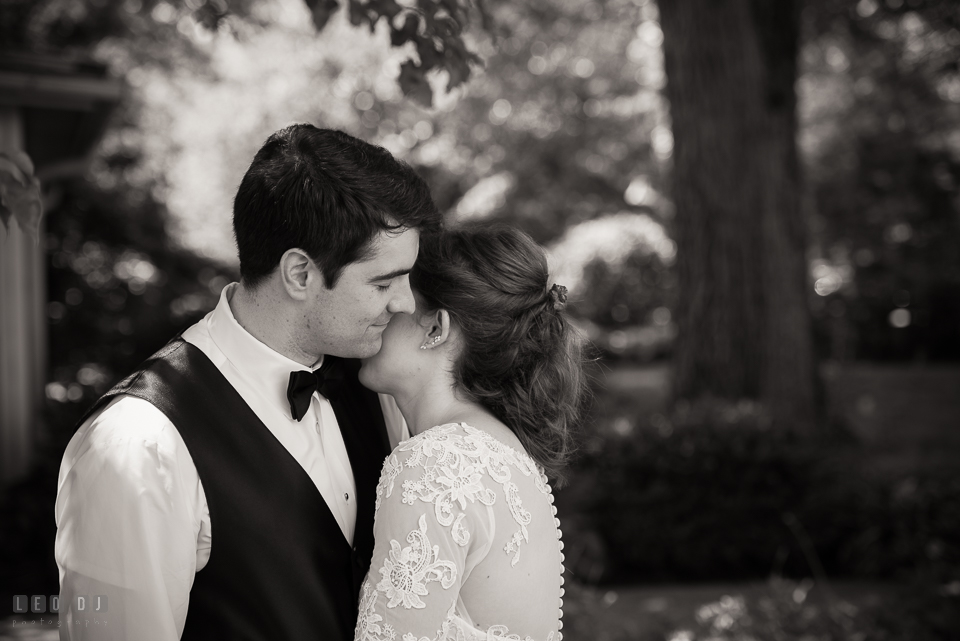 Eastern Shore Maryland wedding Bride cuddling with Groom photo by Leo Dj Photography