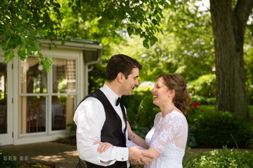 Kent Manor Inn wedding Groom laughing with Bride photo by Leo Dj Photography