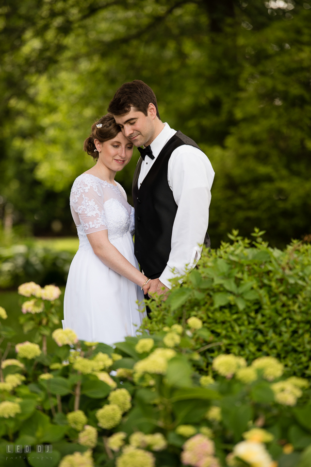 Kent Manor Inn wedding Bride and Groom holding hands photo by Leo Dj Photography