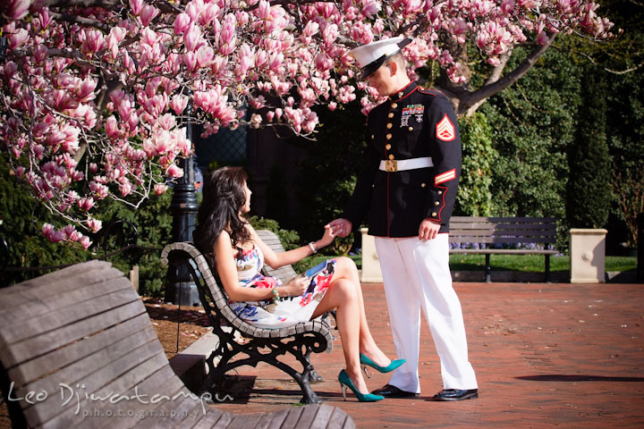 Engaged Marine officer in military uniform holding his fiancée's hand. Pre wedding engagement photo Washington DC Smithsonians museum and Ronald Reagan Washington National Airport DCA, by wedding photographer Leo Dj Photography